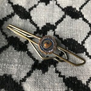 Antique worlds fair tie pin